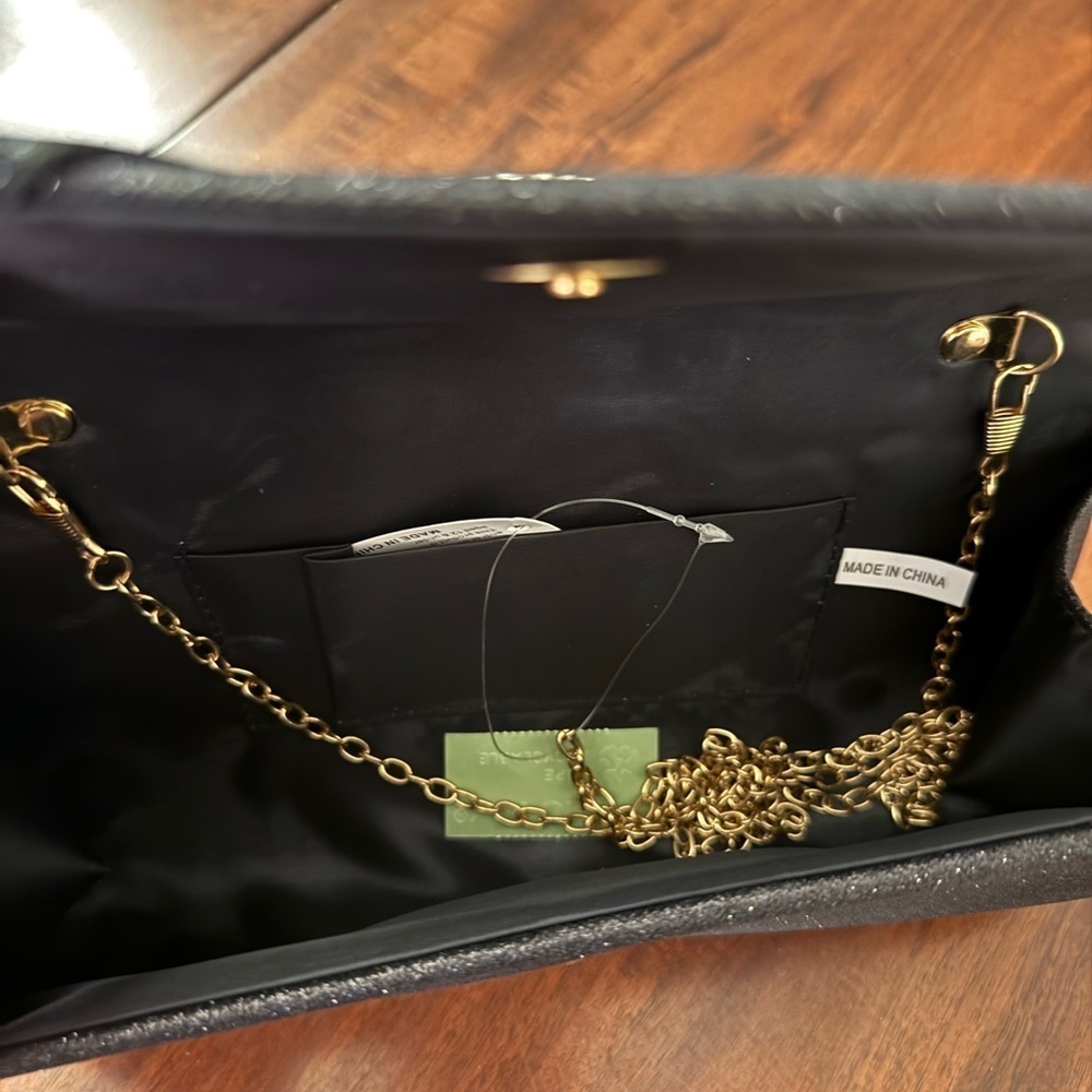 Elegant Black Clutch with Gold Accent - Picture 2 of 2